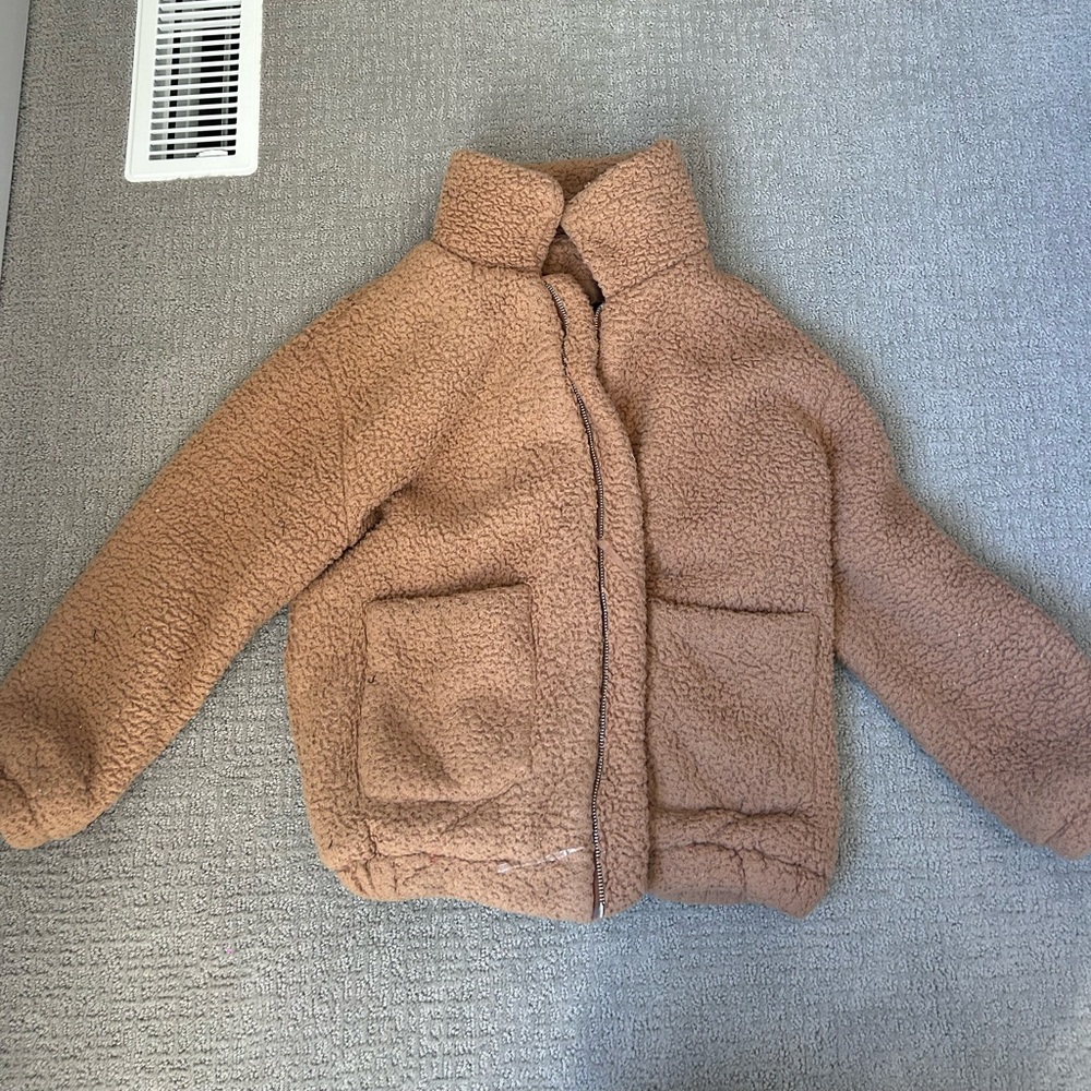 brown fluffy jacket